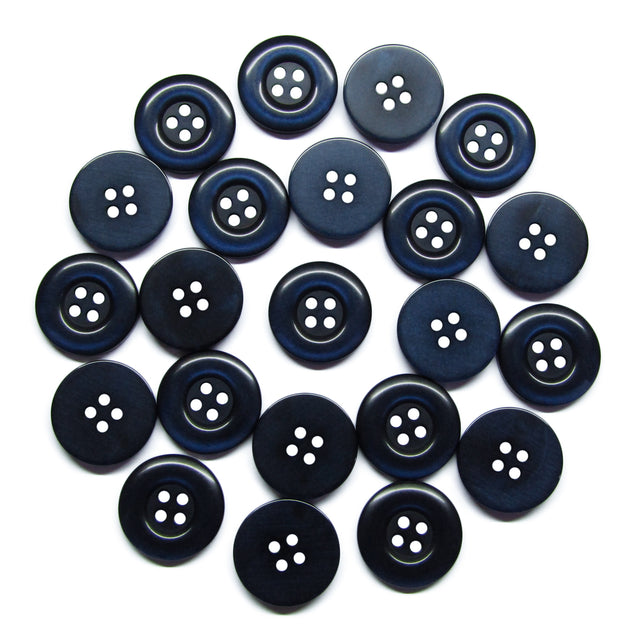 Twenty-three Commercial Food Service Buttons made of black nylon, each with four holes, are scattered in a circular pattern on a white background.