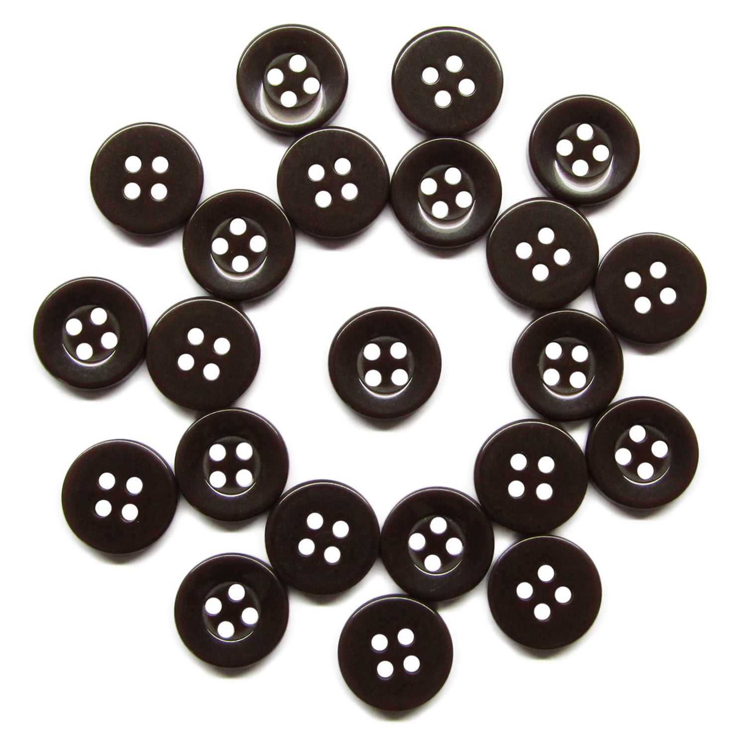 Twenty-one Workshop Uniform Shirt Buttons, made of durable black nylon with four holes each, are arranged in a loose circle on a white background.