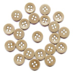 A spiral arrangement of Workshop Uniform Shirt Buttons, made from durable nylon, is displayed on a white background.