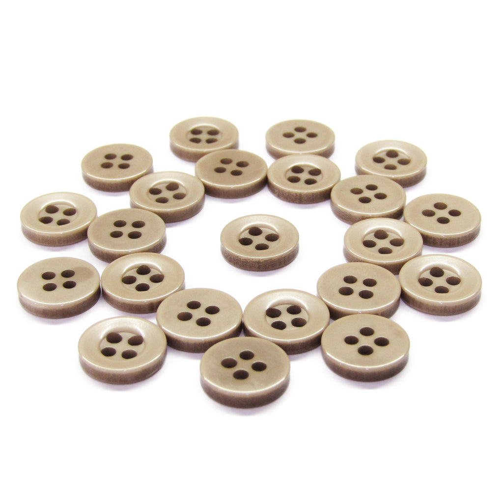 A set of brown, four-hole Workshop Uniform Shirt Buttons made from durable nylon, arranged in a loose circular pattern on a white background.