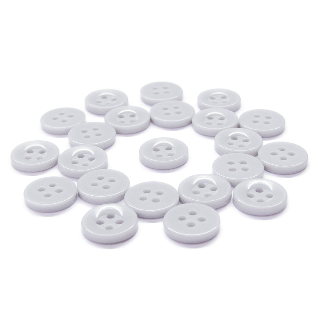 Workshop Uniform Shirt Buttons: round, white, durable nylon with four holes each, scattered on a white background.