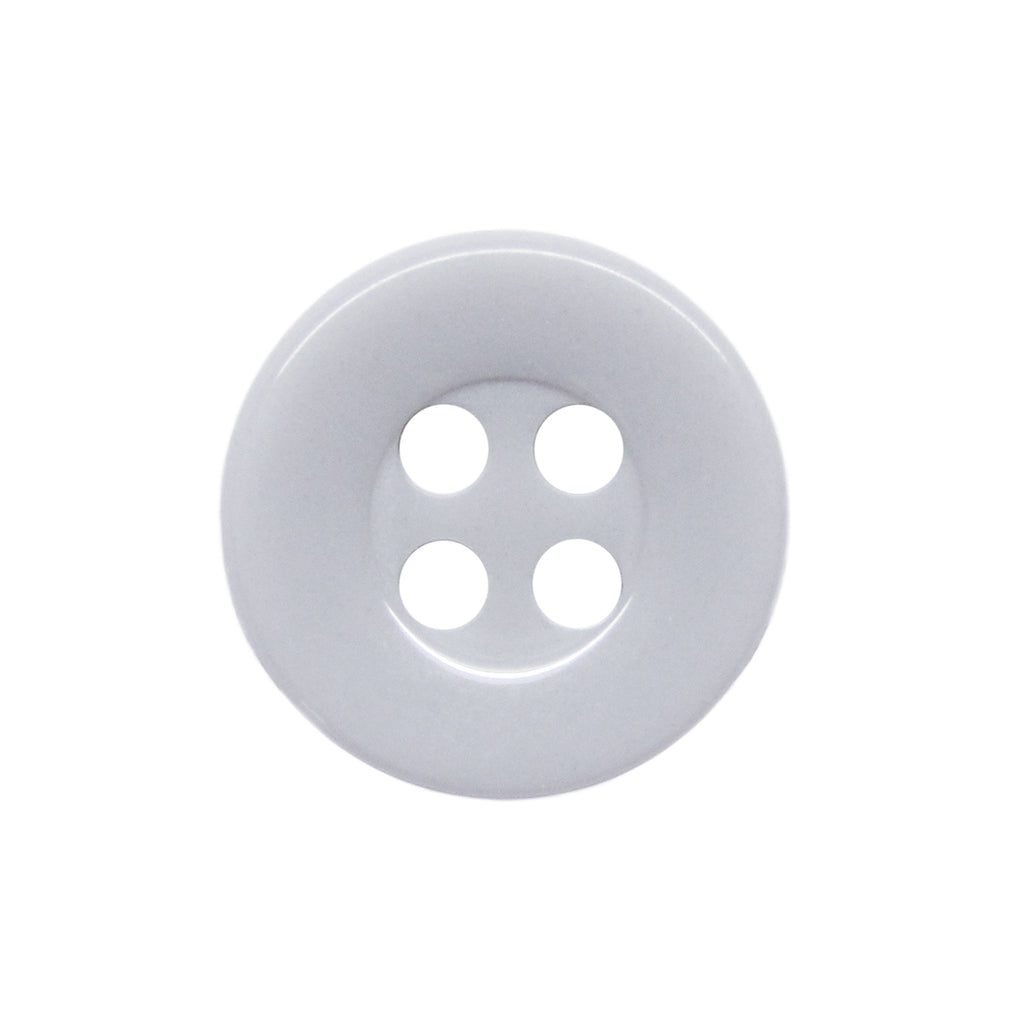 The Workshop Uniform Shirt Buttons are durable, white, round nylon buttons with four center holes—ideal for use on workshop uniform shirts.