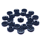 Workshop Uniform Shirt Buttons—crafted from durable dark navy blue nylon—are arranged in a loose circle on a white background, perfect for workshop uniforms.