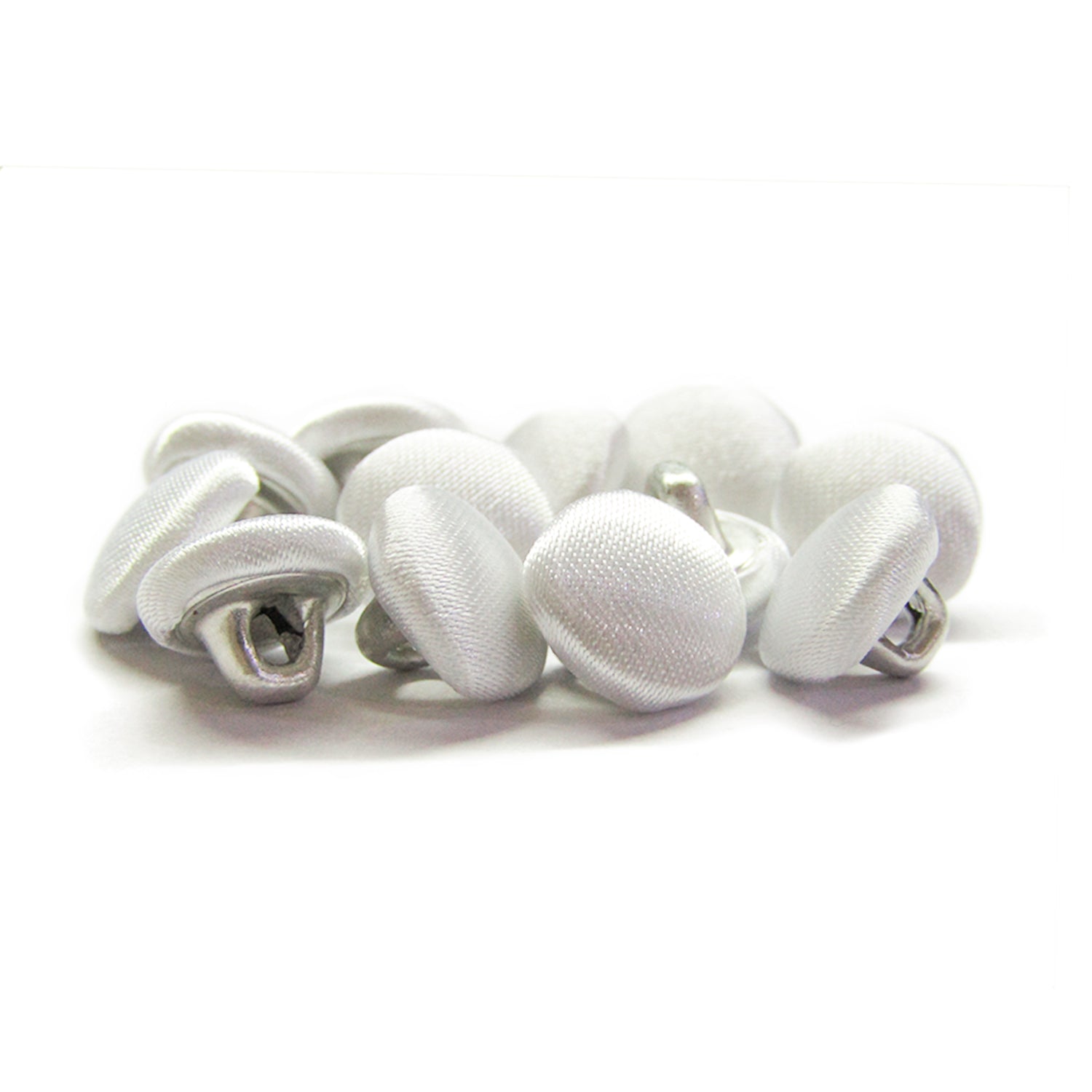 A pile of Silk Satin Bridal Buttons, small, round, and white, on a white background—perfect for adding an elegant touch to any wedding dress.