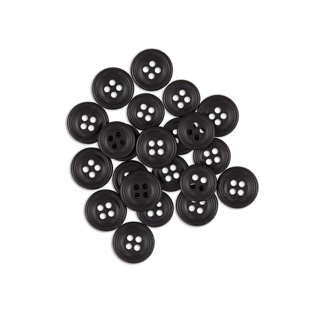 A collection of Cargo Utility Pant Buttons—black, four-hole nylon plastic—scattered on a white background.