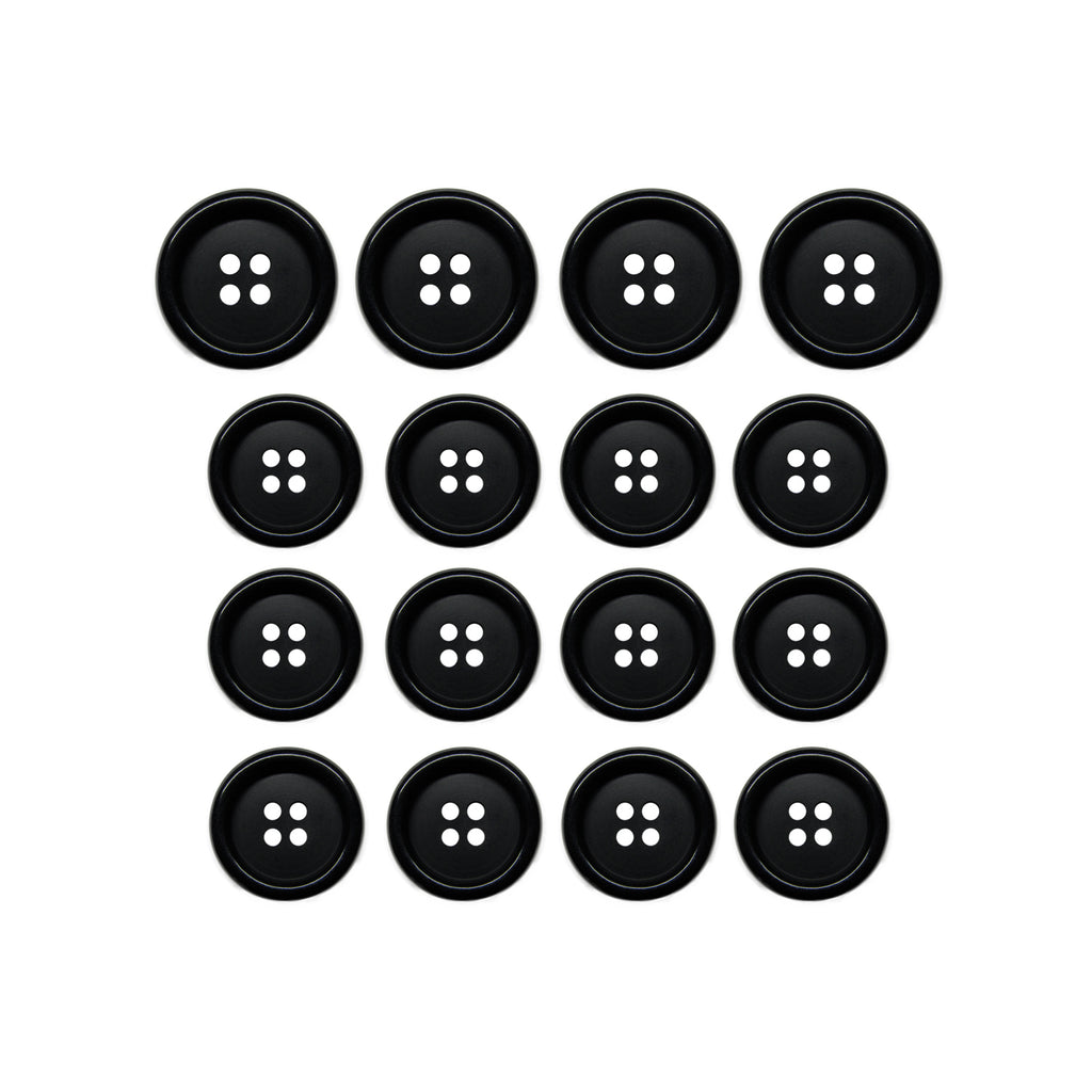 Fifteen Luxury Suit Buttons in black vegan material, each with four holes, arranged in a 4x4 grid with one missing from the bottom row.
