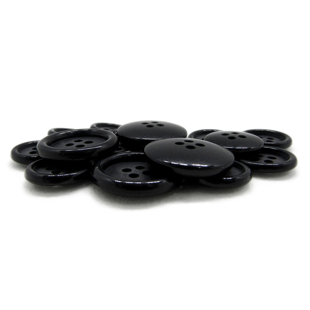 A pile of Luxury Suit Buttons, black, round, four-hole buffalo bone buttons displayed on a white background.