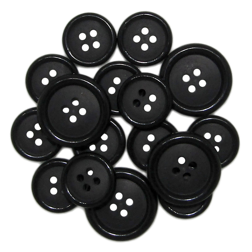 A pile of black round Luxury Suit Buttons with four holes each, including vegan options.