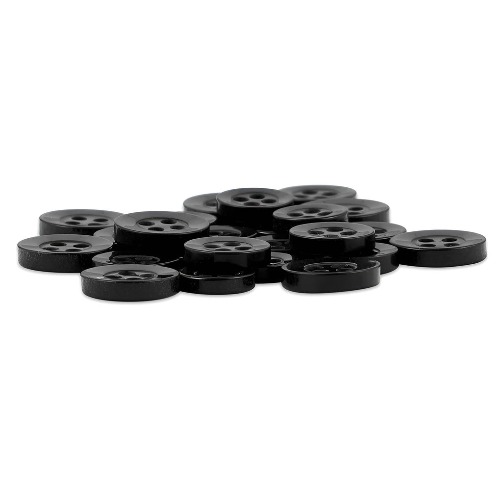 A pile of Replacement Shirt Buttons—small, round, black poly-nylon with a matte finish—rests on a white background, perfect for any tailor’s button kit.