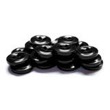 A stack of black, four-hole Work Shirt Buttons made of plastic is arranged on a white background.