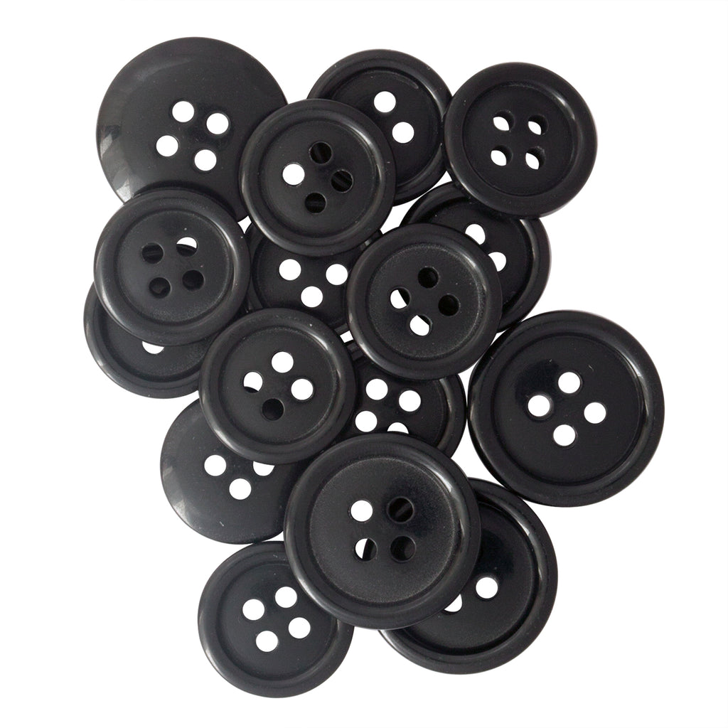 A variety of black, round Standard Suit Buttons with four holes in assorted sizes on a white background—ideal replacements for your black blazer.
