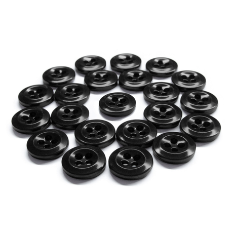 Twenty black Work Shirt Buttons with four holes, arranged in a loose group on a white background.