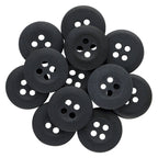 A collection of black, round Khakis, Chinos and Casual Cotton Pant Buttons with four holes, arranged in a circular pile—ideal for replacing pants buttons.