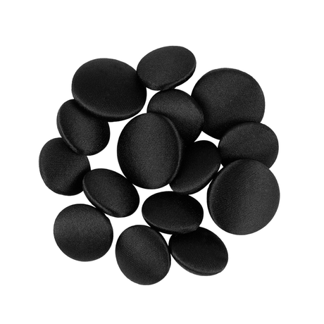 A loose cluster of Tuxedo Suit Buttons made from black satin displayed on a white background.