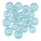 A pile of Replacement Shirt Buttons in light blue with a matte finish and four holes is scattered on a white background—ideal additions to any tailor's button kit.