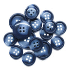 A scattered pile of Luxury Suit Buttons in dark blue with four holes, arranged on a white background.