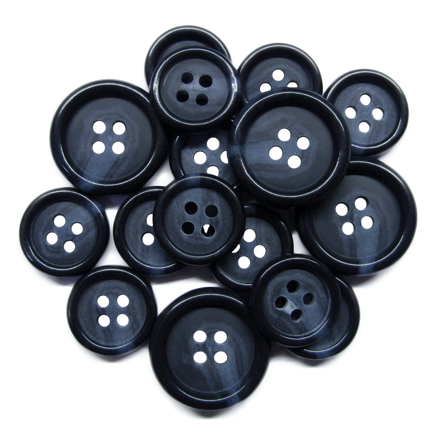 A pile of Luxury Suit Buttons made from black buffalo bone with four holes each, scattered and overlapping on a white background.