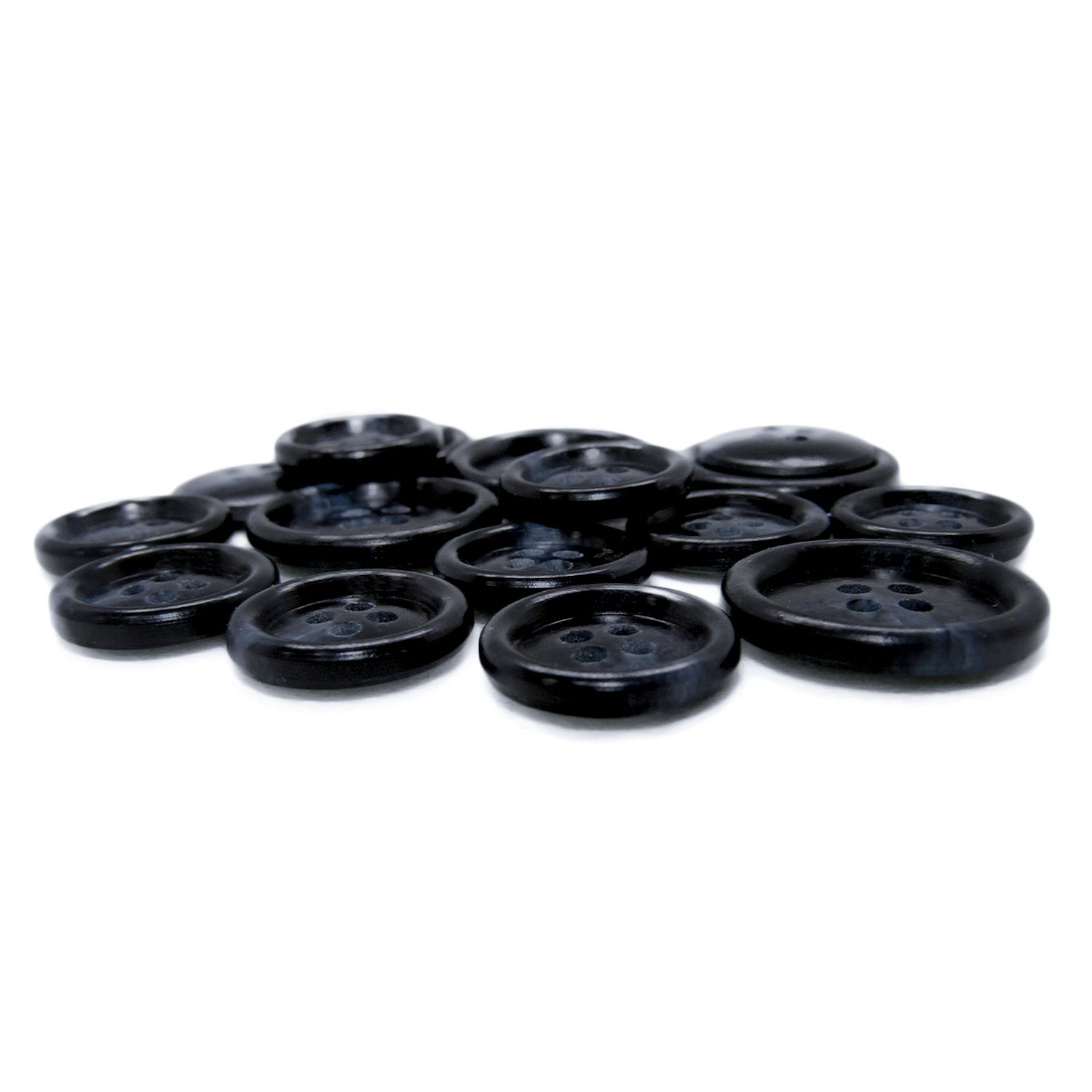 Premium Suit Buttons in black are displayed in a scattered pile on a white background.