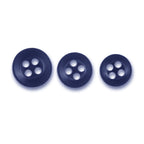 Three Replacement Shirt Buttons in dark blue matte poly-nylon, each a different size with four holes, are arranged in a row on a white background—ideal additions to any tailor’s button kit.
