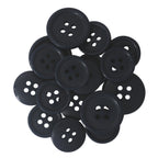 A pile of Standard Suit Buttons, black and round with multiple holes, displayed on a white background.