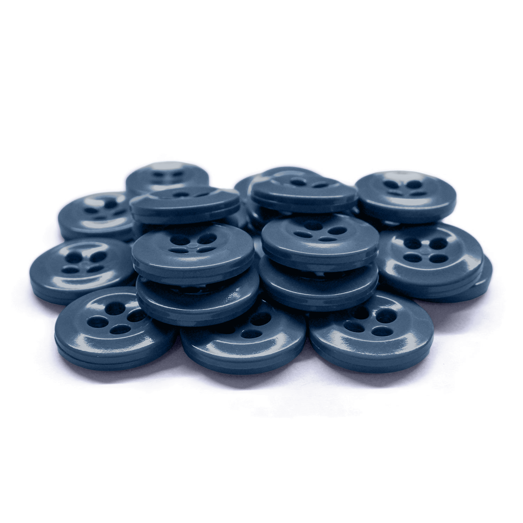 A set of blue, durable Work Shirt Buttons (22 pack) with four holes, arranged on a white surface.