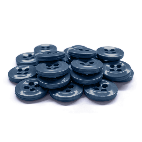 A pile of blue plastic Work Shirt Buttons with four holes is displayed on a white background.