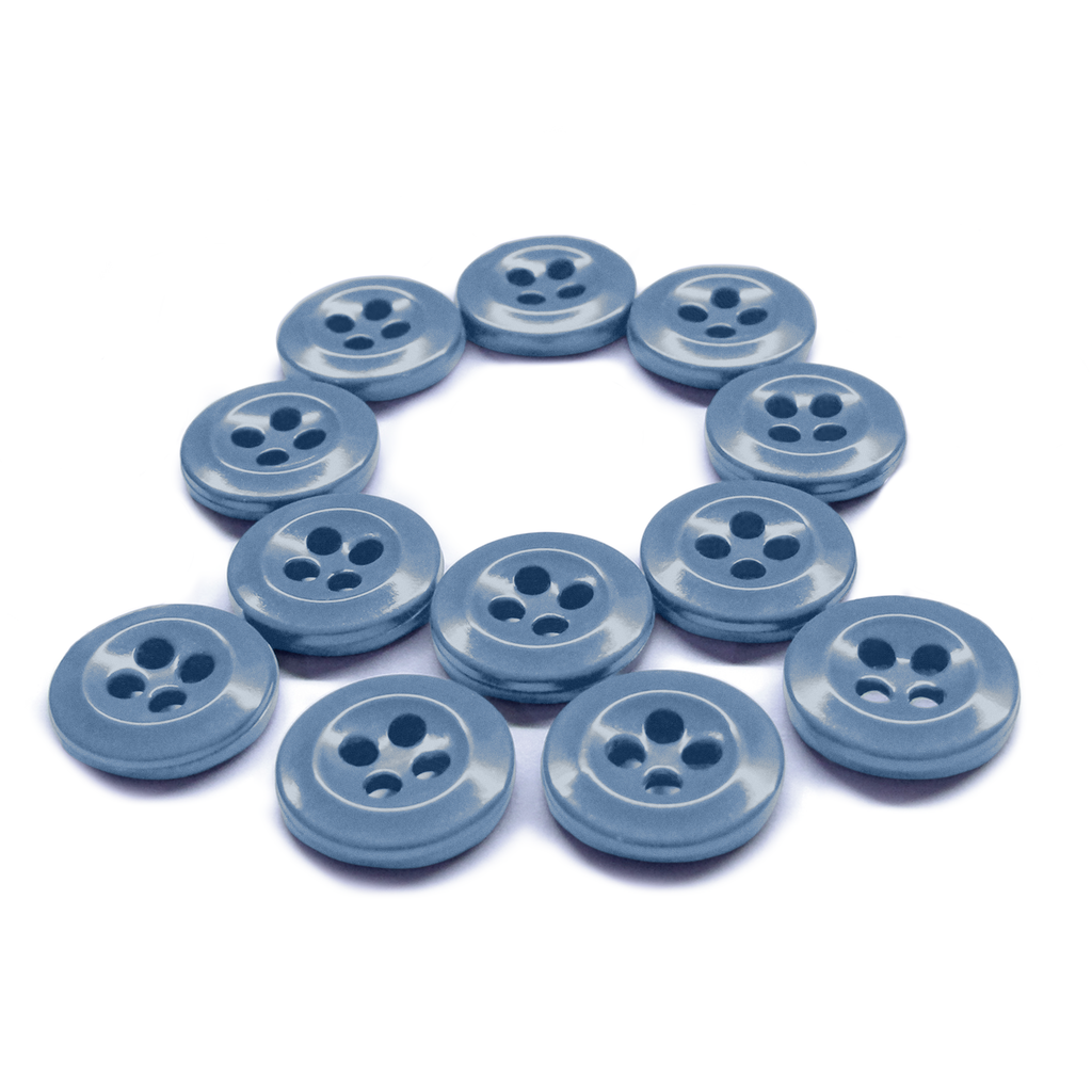 Twelve blue Work Shirt Buttons from the 12 Pack are arranged in the shape of the letter Q on a white background.