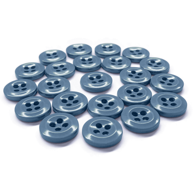 Twenty-three blue Work Shirt Buttons, each with four holes, are arranged in a rough circle on a white background.