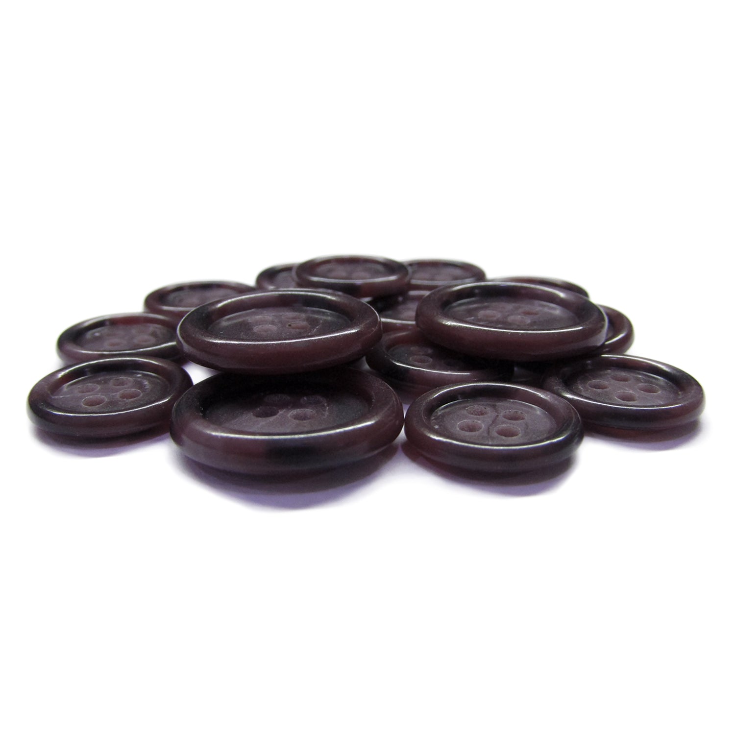 A set of dark brown, round, four-hole Luxury Suit Buttons made from buffalo bone displayed on a white surface.