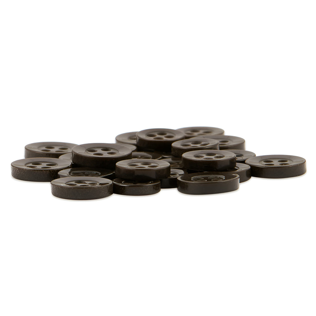 A pile of Replacement Shirt Buttons—small, round, black four-hole poly-nylon buttons with a matte finish—lies on a white background.