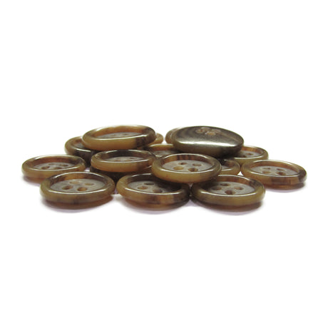 Luxury Suit Buttons with four holes are shown in a pile on a white background.