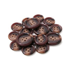 A pile of brown, round, four-hole Luxury Suit Buttons is arranged on a white background.