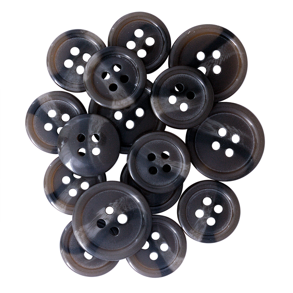 A cluster of Standard Suit Buttons, round and brown with four holes, arranged closely together on a white background.