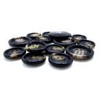 A pile of Premium Suit Buttons, round with four holes and a black and brown marbled design, displayed on a white background.