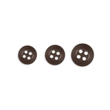 Three dark brown Replacement Shirt Buttons with an anti-glare matte finish, each featuring four holes and different sizes, are arranged in a row on a white background—ideal for any tailor's button kit.