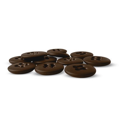 A pile of round Suspender Brace Pant Buttons, each with a paw print design on top and a vintage look, displayed on a white background.