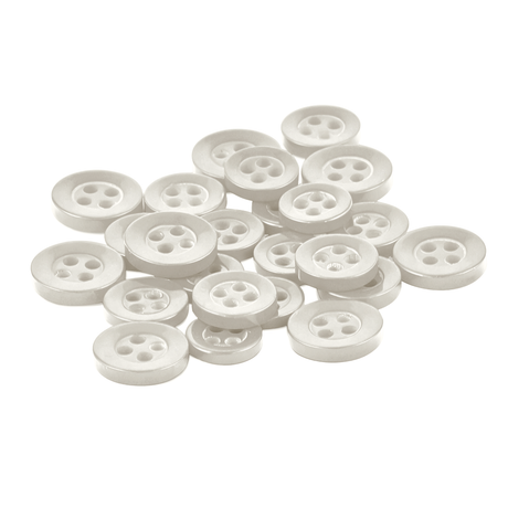 A pile of small, round, white Replacement Shirt Buttons scattered on a white background—perfect additions to any tailor's kit.