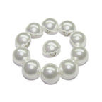 Ten Dome Faux Pearl Bridal Buttons with metal loop backs, featuring white half-round "pearl" tops and silver loops, are arranged in a circle—perfect for replacing blouse buttons or adding bustle buttons to garments.
