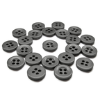 A set of Workshop Uniform Shirt Buttons, black with four holes, displayed in a loose, scattered arrangement on a white background.