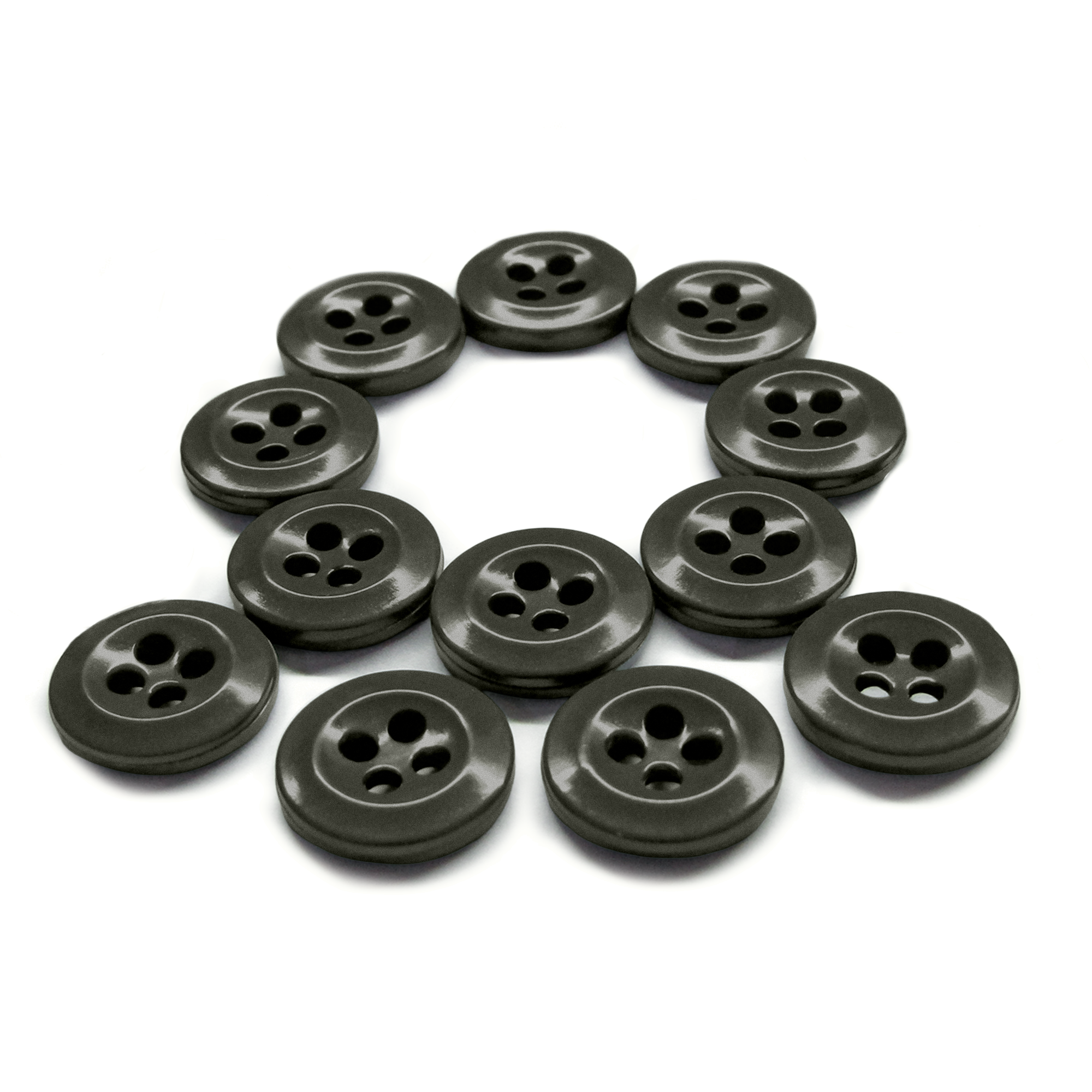 Twelve black Work Shirt Buttons from the 12 Pack are arranged in the shape of the letter Q on a white background.