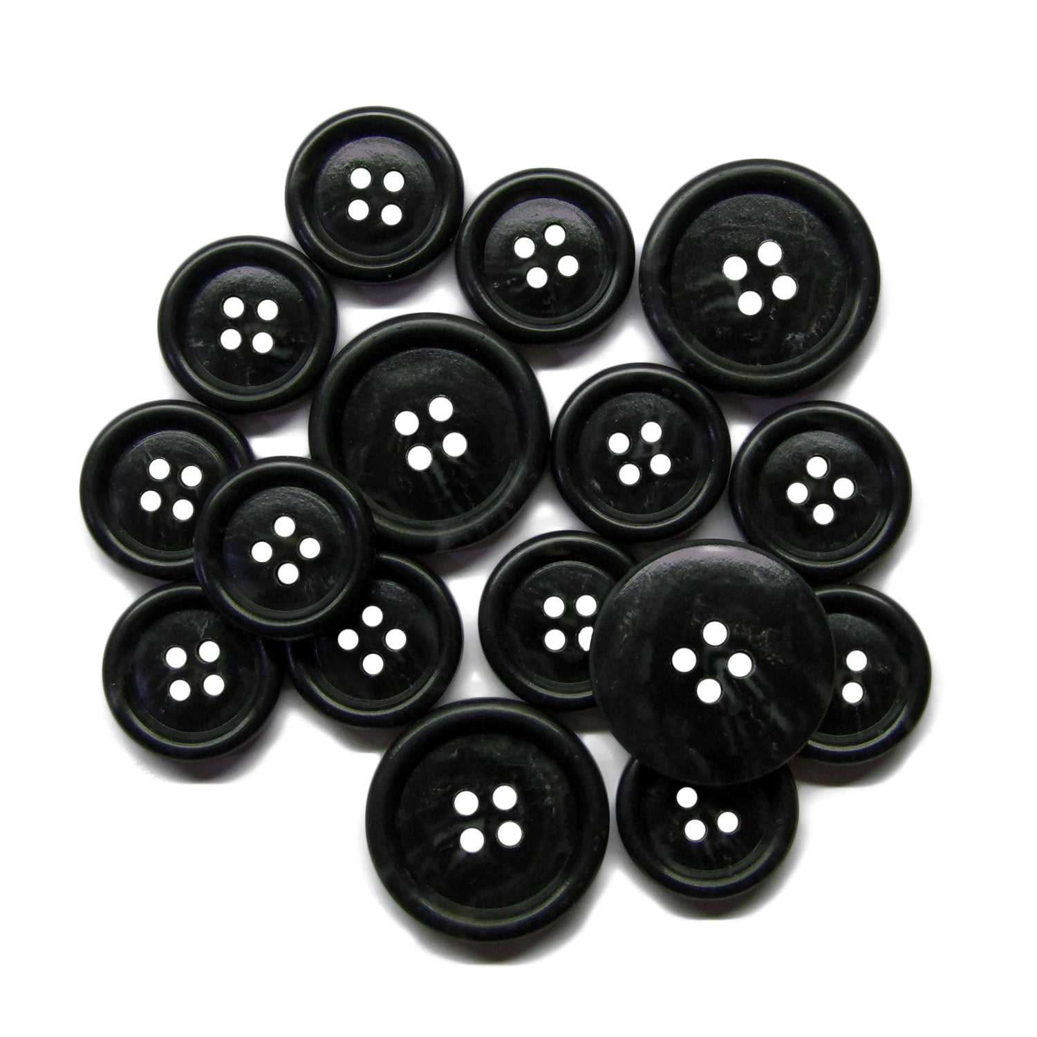Premium Suit Buttons—round, black, four-hole, and available in various sizes—are neatly arranged on a white background.