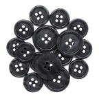 Luxury Suit Buttons: A cluster of black, round, four-holed buttons arranged closely on a white background.