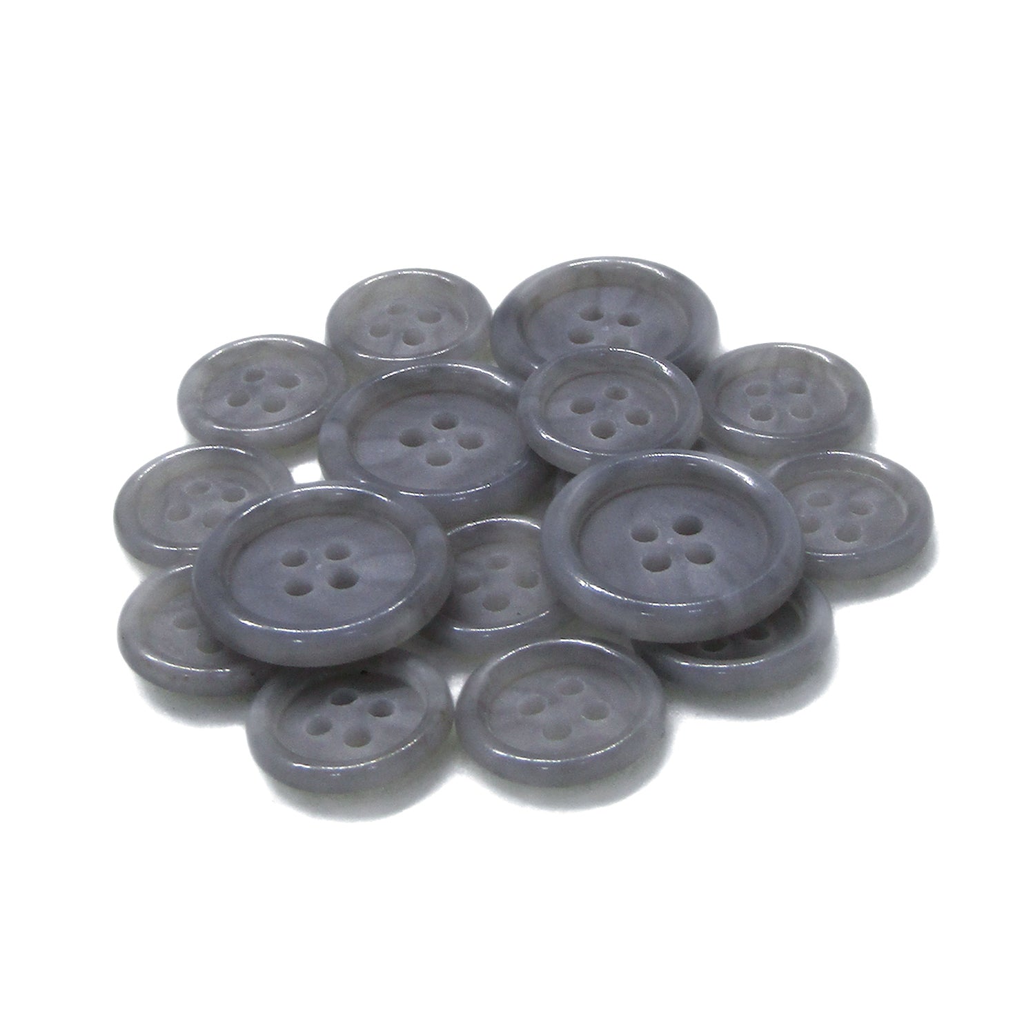 A pile of round, gray Luxury Suit Buttons with four holes, arranged on a white background.