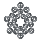 Twenty-four Replacement Shirt Buttons arranged in a star pattern on a white background.
