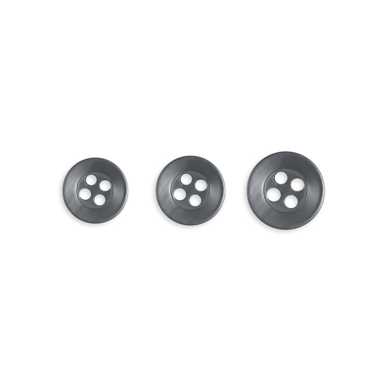 Three Replacement Shirt Buttons of increasing size, ideal for a tailor's kit, are neatly arranged in a row on a white background.