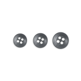 Three Replacement Shirt Buttons of increasing size, ideal for a tailor's kit, are neatly arranged in a row on a white background.