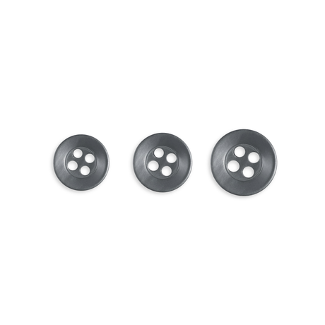Three Replacement Shirt Buttons of increasing size, ideal for a tailor's kit, are neatly arranged in a row on a white background.