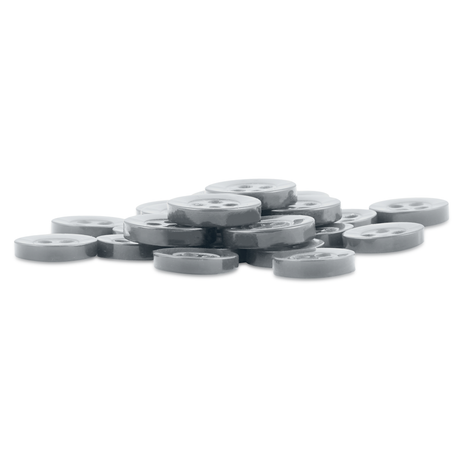 A set of small, round, gray Replacement Shirt Buttons with four holes each, stacked on a white background—ideal for updating shirts or any tailor’s kit.