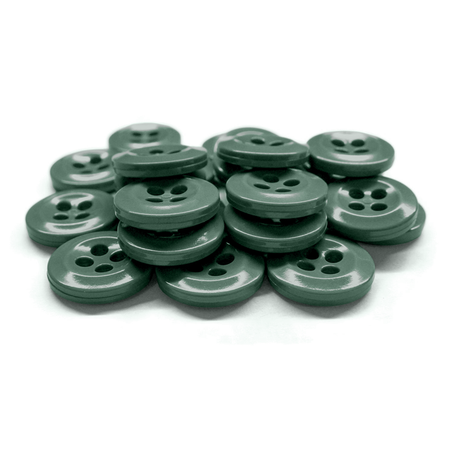 A stack of green Work Shirt Buttons arranged on a white surface.
