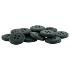 A pile of round, black, four-hole Khakis, Chinos and Casual Cotton Pant Buttons on a white background—ideal as replacement buttons for your wardrobe needs.